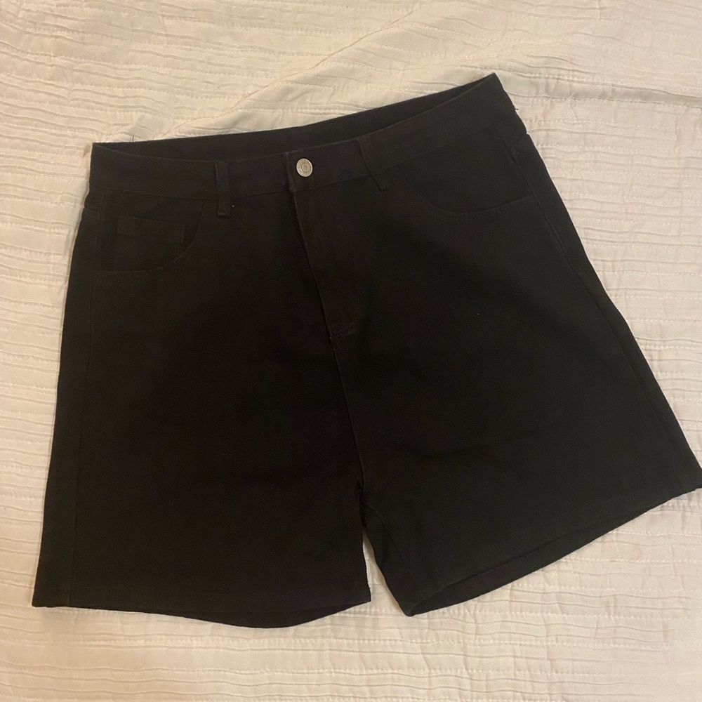 High waisted black jean shorts.
